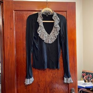 Black sweater with black and white trim